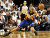 MIAMI, FL - MAY 09: Center Tyson Chandler #6 of the New York Knicks passes the ball against the Miami Heat in Game Five of the Eastern Conference Quarterfinals in the 2012 NBA Playoffs on May 9, 2012 at the American Airines Arena in Miami, Florida. NOTE TO USER: User expressly acknowledges and agrees that, by downloading and or using this photograph, User is consenting to the terms and conditions of the Getty Images License Agreement. (Photo by Marc Serota/Getty Images)