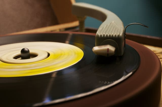 Old-fashioned record player    * Needle    * Signs and Symbols    * Activity    * Simplicity    * Enjoyment    * Performan