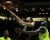 ALBUQUERQUE, NM - MARCH 17: Askia Booker #0 of the Colorado Buffaloes shoots against Quincy Acy #4 of the Baylor Bears in the second half of the game during the third round of the 2012 NCAA Men's Basketball Tournament at The Pit on March 17, 2012 in Albuquerque, New Mexico. Baylor won 80-63 in regualtion. (Photo by Ronald Martinez/Getty Images)