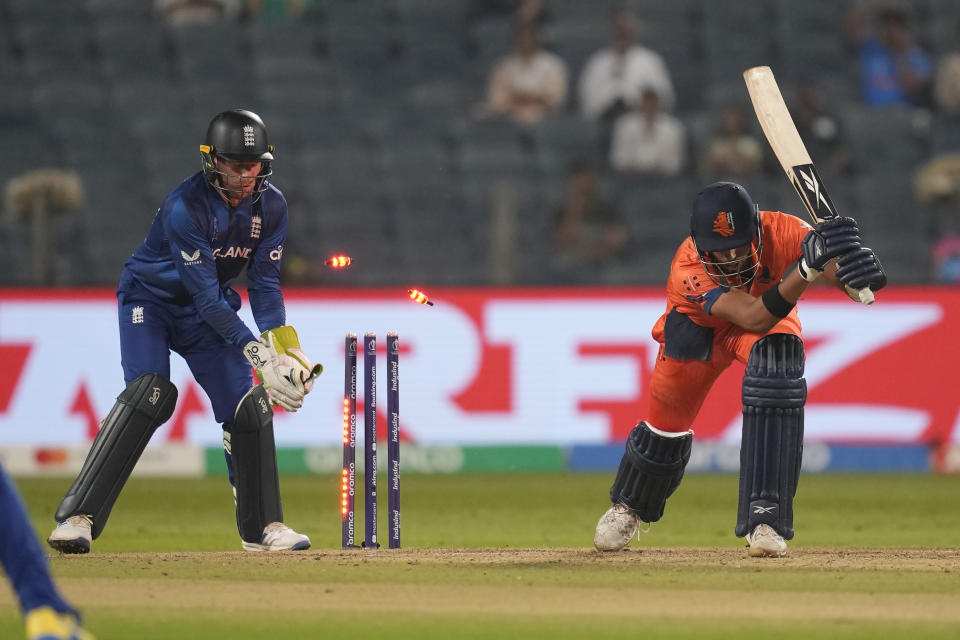 Netherlands' Aryan Dutt is bowled out by England's Adil Rashid during the ICC Men's Cricket World Cup match between England and Netherlands in Pune, India, Wednesday, Nov. 8, 2023. (AP Photo/Rafiq Maqbool)