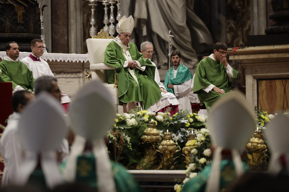 Pope Francis celebrates a Mass in St. Peter Basilica at the Vatican, Sunday, Nov. 17, 2019. Pope Francis is offering several hundred poor people, homeless, migrants, unemployed a lunch on Sunday as he celebrates the World Day of the Poor with a concrete gesture of charity in the spirit of his namesake, St. Francis of Assisi. (AP Photo/Alessandra Tarantino)