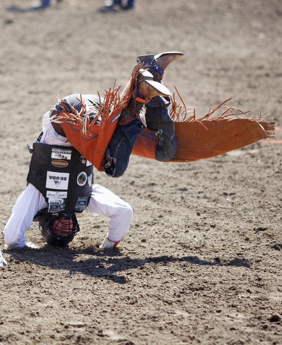 Bull rider Byrne lands on his head after his bull ride on Kyle Style during day 2 of the Calgary Stampede rodeo in Calgary