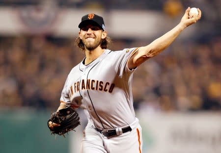 Oct 1, 2014; Pittsburgh, PA, USA; San Francisco Giants starting pitcher Madison Bumgarner (40) throws a pitch against the Pittsburgh Pirates during the first inning of the 2014 National League Wild Card playoff baseball game at PNC Park. Charles LeClaire-USA TODAY Sports