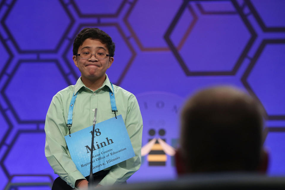 <p>Minh Nguyen of Gilberts, Ill., reacts as he tries to spell his word during round two of 2017 Scripps National Spelling Bee. (Alex Wong/Getty Images) </p>