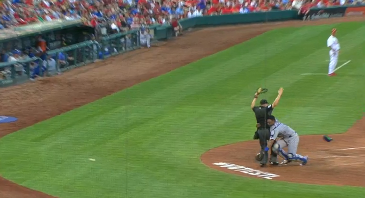 Salvador Perez accidentally tackles an umpire while trying to catch a foul ball.