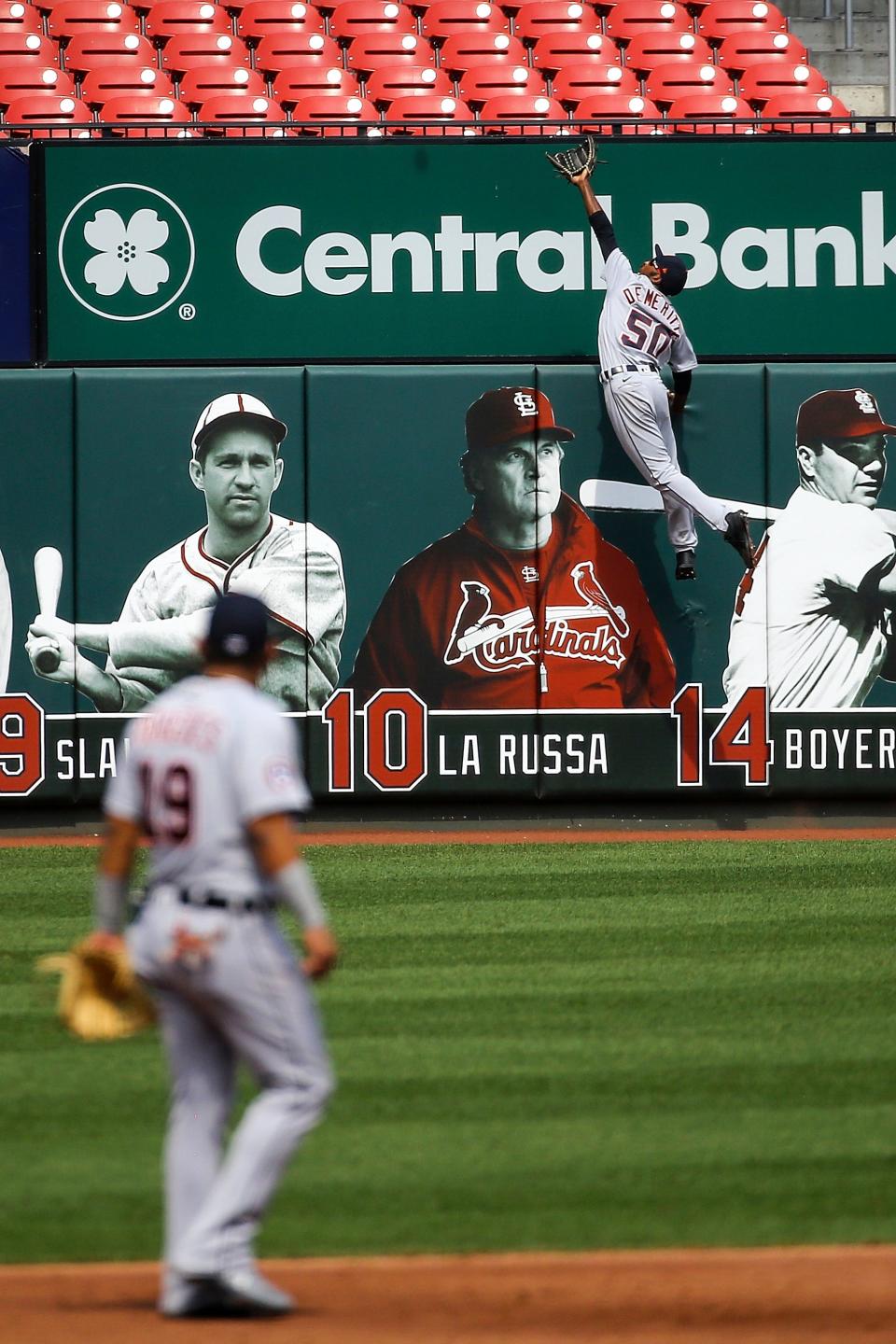 Tigers third baseman Isaac Paredes looks on as left fielder Travis Demeritte is unable to catch a home run ball hit by Cardinals catcher Yadier Molina, not pictured, during the second inning in the first game of a doubleheader against the Cardinals on Thursday, Sept. 10, 2020, in St. Louis.