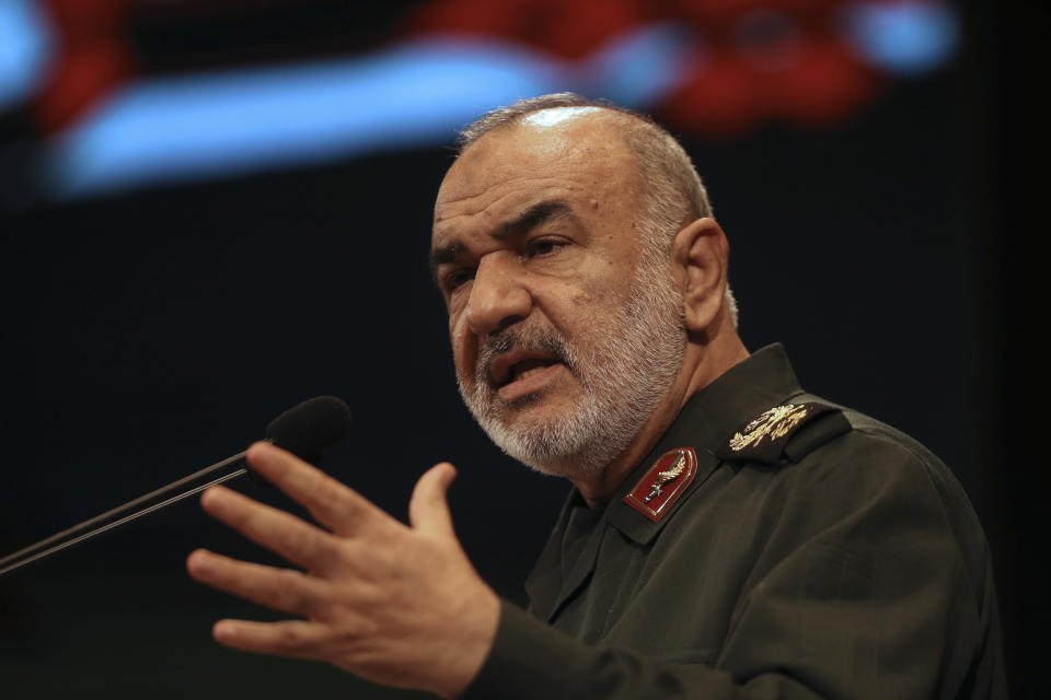 In this Nov. 22, 2018, the then deputy commander of Iran's Revolutionary Guard Gen. Hossein Salami speaks in a conference in Tehran, Iran. Iran's Revolutionary Guard shot down a U.S. drone on Thursday, June 20, 2019, amid heightened tensions between Tehran and Washington over its collapsing nuclear deal with world powers, American and Iranian officials said, while disputing the circumstances of the incident. The current chief of the Guard, Gen. Salami, speaking to a crowd in the western city of Sanandaj on Thursday, described the American drone as "violating our national security border." (AP Photo/Vahid Salemi)