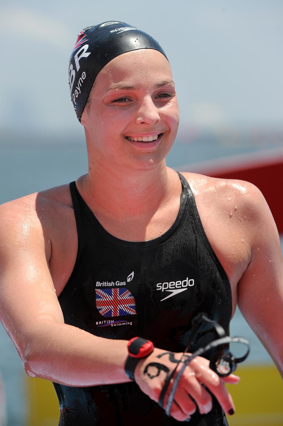 Britain's swimmer Keri-Anne Payne smiles after winning the women's 10km open water swimming event of the FINA World Championships in Shanghai on July 19, 2011. Payne, who took silver at the 2008 Beijing Games, swam the women's 10km open water in 2hr 1min 58.1secs, ramping up hopes for London 2012.  AFP PHOTO/PHILIPPE LOPEZ (Photo credit should read PHILIPPE LOPEZ/AFP/Getty Images)