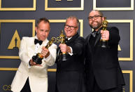 Filmmakers Jonas Rivera, Mark Nielsen and Josh Cooley, winners of the Animated Feature Film award for “Toy Story 4,” pose in the press room during the 92nd Annual Academy Awards at Hollywood and Highland on February 09, 2020 in Hollywood, California. (Photo by Amy Sussman/Getty Images)