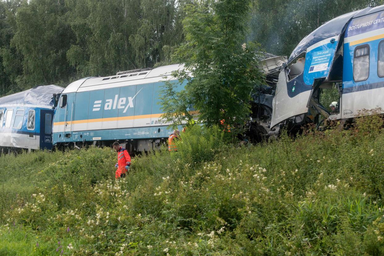 Two collided trains are pictured near the village of Milavce between the stations Domazlice and Blizejovn, Czech Republic, on August 4. 