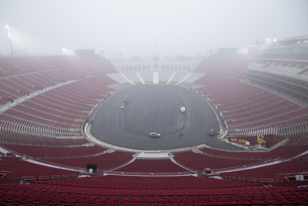 The Coliseum is being converted to a race track for the Busch Light Clash at the Coliseum NASCAR race