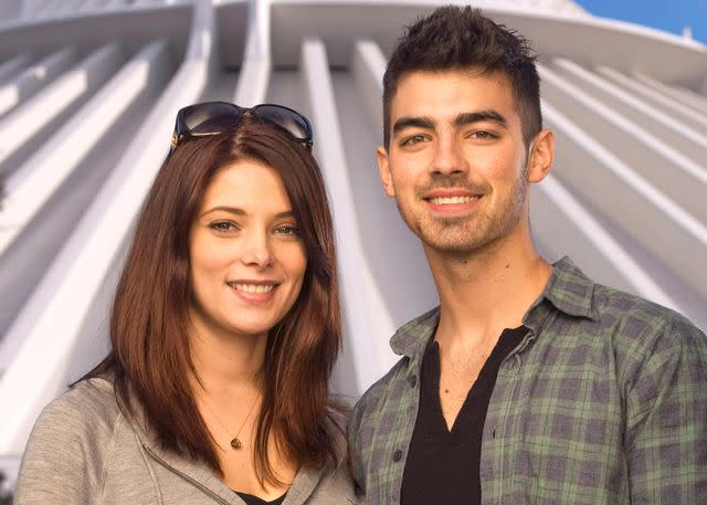 <p>Kent Phillips/Disney via Getty</p> Ashley Greene and Joe Jonas in December 2010