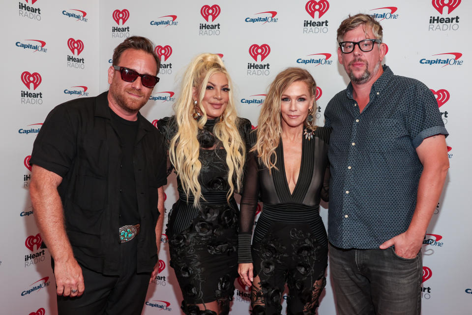 Dan Auerbach, Tori Spelling, Jennie Garth, and Patrick Carney during night one of the iHeartRadio Music Festival held at T-Mobile Arena on September 23, 2022 in Las Vegas, Nevada.