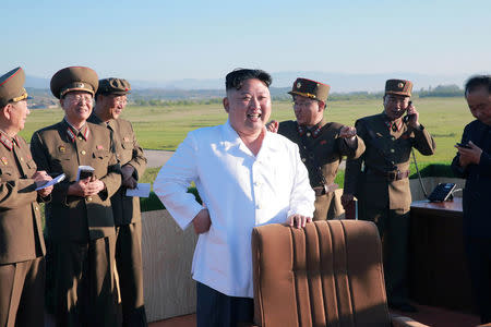 North Korean leader Kim Jong Un watches the test of a new-type anti-aircraft guided weapon system organised by the Academy of National Defence Science in this undated photo released by North Korea's Korean Central News Agency (KCNA) May 28, 2017. KCNA/via REUTERS