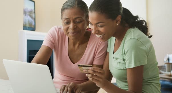 Mother and daughter shopping online