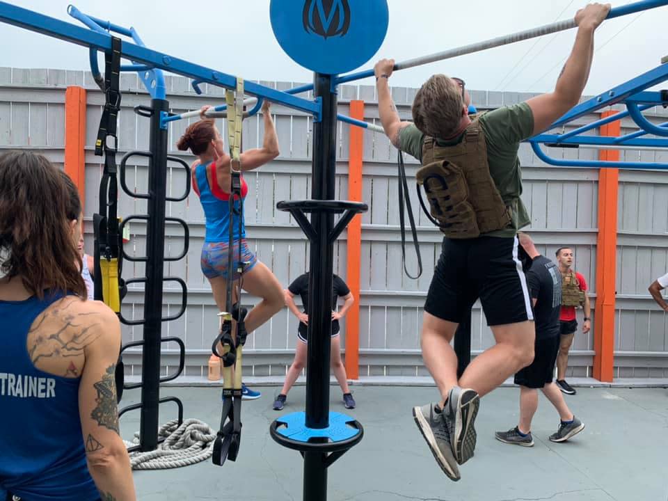 Participants do pullups during last year's Murph Challenge.