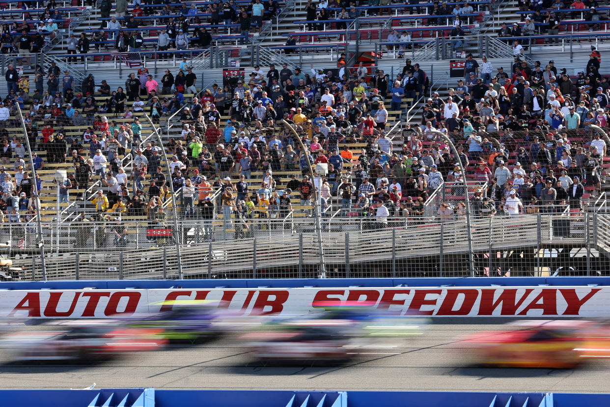 FONTANA, CALIFORNIA - FEBRUARY 27: A general view of racing during the NASCAR Cup Series Wise Power 400 at Auto Club Speedway on February 27, 2022 in Fontana, California. (Photo by James Gilbert/Getty Images)