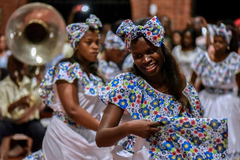 Afro-Colombians dance "Fuga" (Traditional dance) during the "Adoraciones al Nino Dios" celebrations in Quinamayo