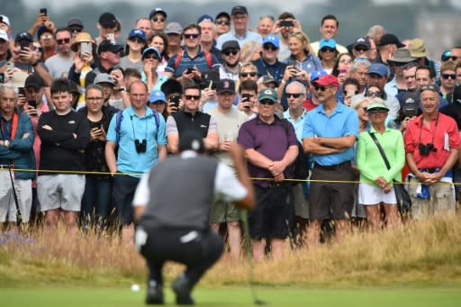 Huge crowds followed Tiger Woods round the course at Carnoustie on Saturday