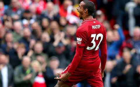 Joel Matip of Liverpool celebrates after scoring his team's second goal during the Premier League match between Liverpool FC and Southampton FC - Credit: Getty IAlex Liveseymages