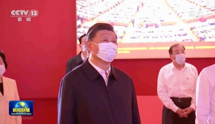 In this image taken from video footage run by China's CCTV, Chinese President Xi Jinping and other Chinese leaders visit an exhibit with the theme of 