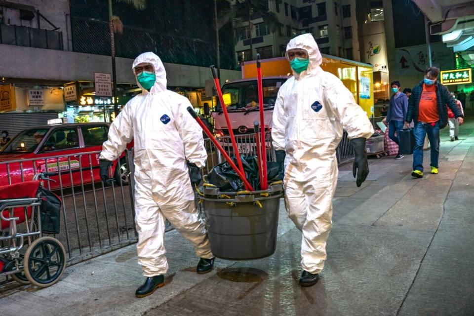 Workers from Department of Health in Hong Kong | Anthony Kwan/Getty Images