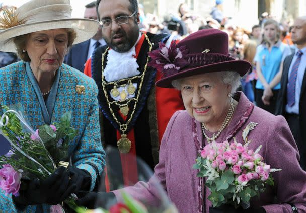 PHOTO: Queen Elizabeth II, accompanied by her lady-in-waiting, Diana, Lady Susan Hussey undertakes a walkabout to mark her Diamond Jubilee, April 30, 2012 in Windsor, England. (Anwar Hussein/WireImage, via Getty Images, FILE)