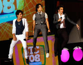 <p>Nick, Joe, and Kevin dangled over the crowd at the 2008 Teen Choice Awards, where they nabbed six surfboards, including one for Choice Male Hottie. The band tied with <em>Gossip Girl</em> for the most awards of the night. (Photo: K Mazur/TCA 2008/WireImage) </p>