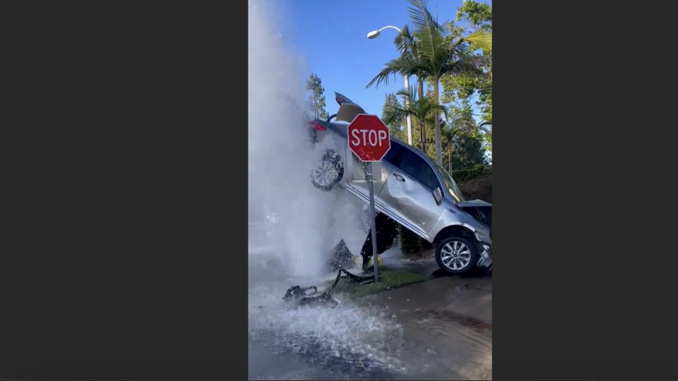 a car driving through a flooded street