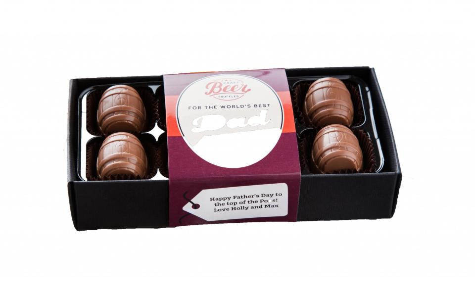 <p><a rel="nofollow noopener" href="https://www.notonthehighstreet.com/thechocolatelibrary/product/world-s-best-dad-craft-beer-chocolates" target="_blank" data-ylk="slk:Not On The High Street, £12;elm:context_link;itc:0;sec:content-canvas" class="link ">Not On The High Street, £12</a> </p>