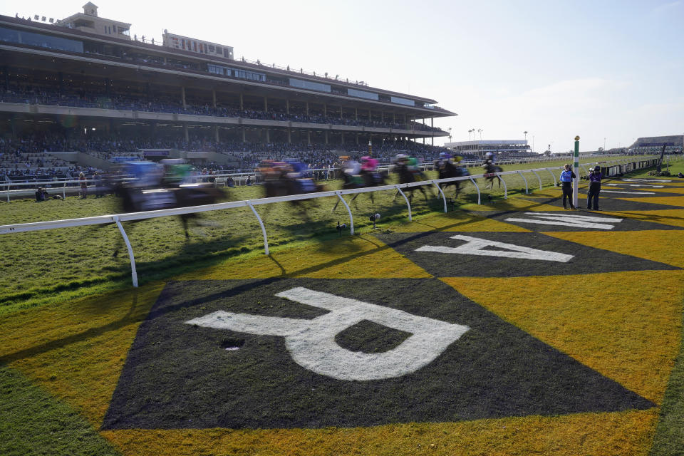 Competitors ride during the Breeders' Cup Mile race at the Del Mar racetrack in Del Mar, Calif., Saturday, Nov. 6, 2021. (AP Photo/Gregory Bull)