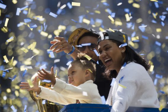 The Curry family celebrates the Warriors’ 2015 championship. (Stephen Lam/Getty Images)