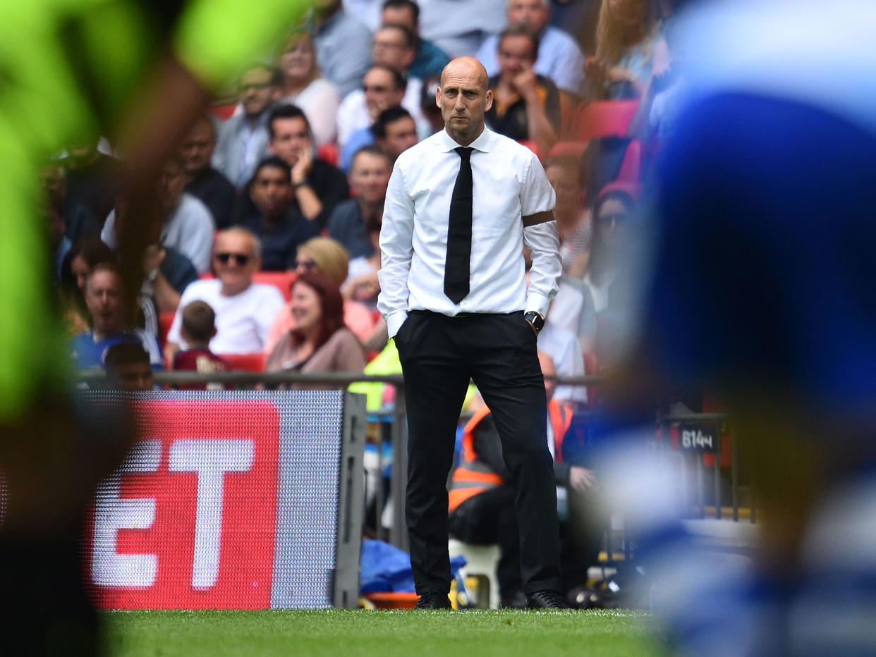 Jaap Stam looks on from the Wembley sideline: Getty