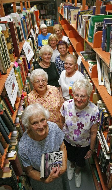 Lucia Hotton, third from front, and other Friends of the Weymouth Libraries gather in 2014.