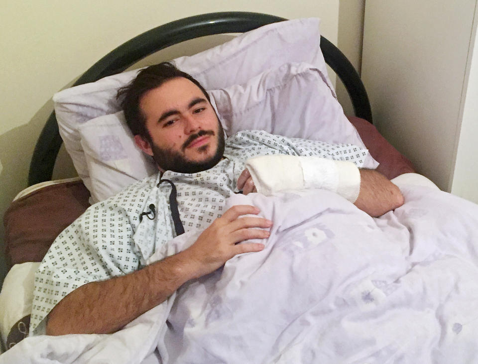 Francisco Lopes, a Portuguese national who was injured during the London terror attack, at his home in London, during an interview with the Associated Press, Thursday, March, 23, 2017. Lopes, a 26-year-old who has lived in London for 15 years, is now awaiting surgery for his hand but is struggling to sleep. (AP Photo/ Sophie Berman)