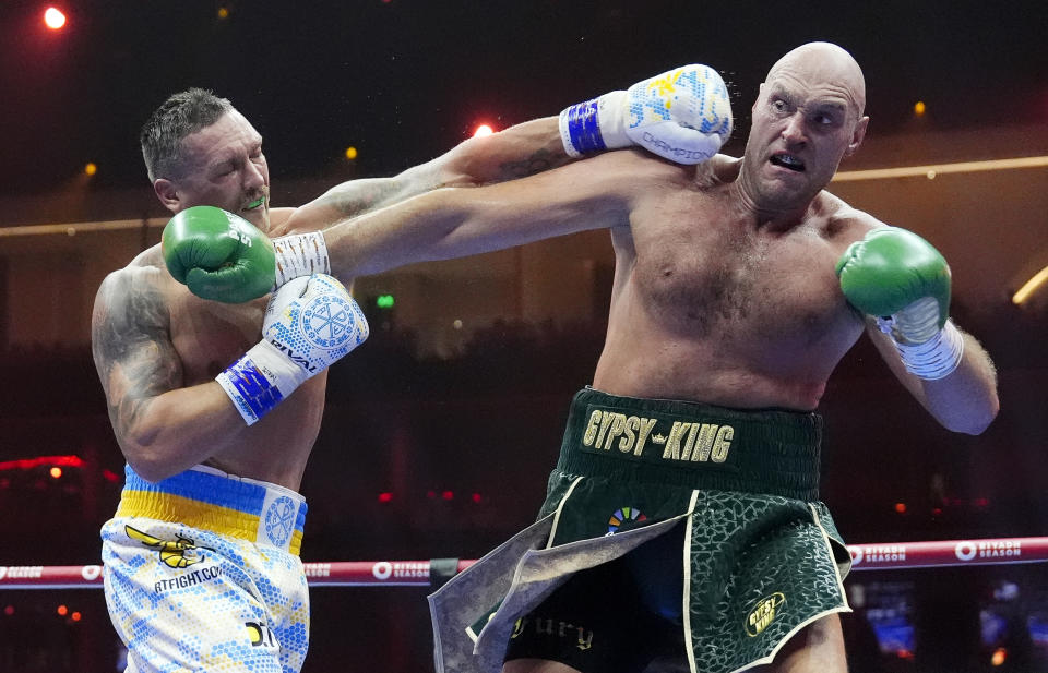 Oleksandr Usyk (left) punches Tyson Fury during their heavyweight championship bout at Kingdom Arena in Riyadh. Photo date: Saturday, May 18, 2024 (Photo by Nick Potts/PA Images via Getty Images)