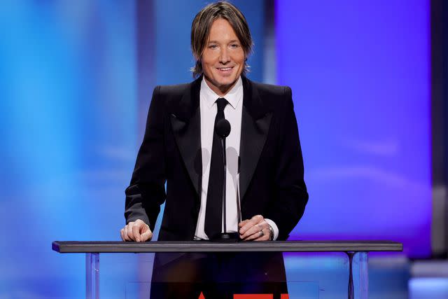 <p>Kevin Winter/Getty</p> Keith Urban
