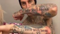 machine gun kelly travis barker tattoo album change born with horns massive sellout