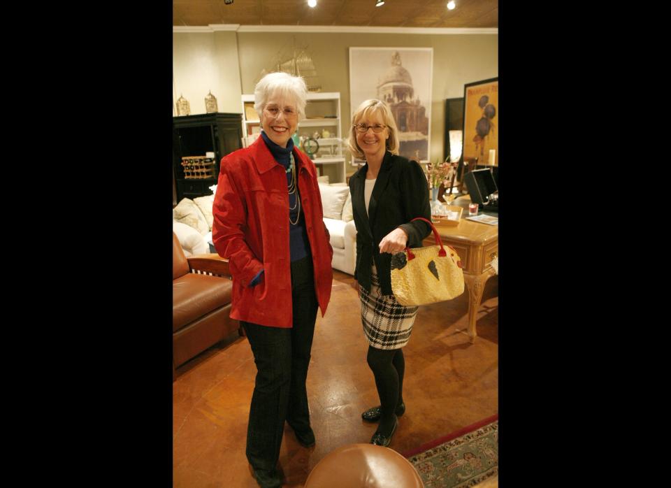 Customers sometimes wonder if they're in the right place when they arrive at Rebound. They think they're there to buy pre-owned furniture -- but everything looks shiny and new. Here, Faye takes some time to show a customer around the shop.