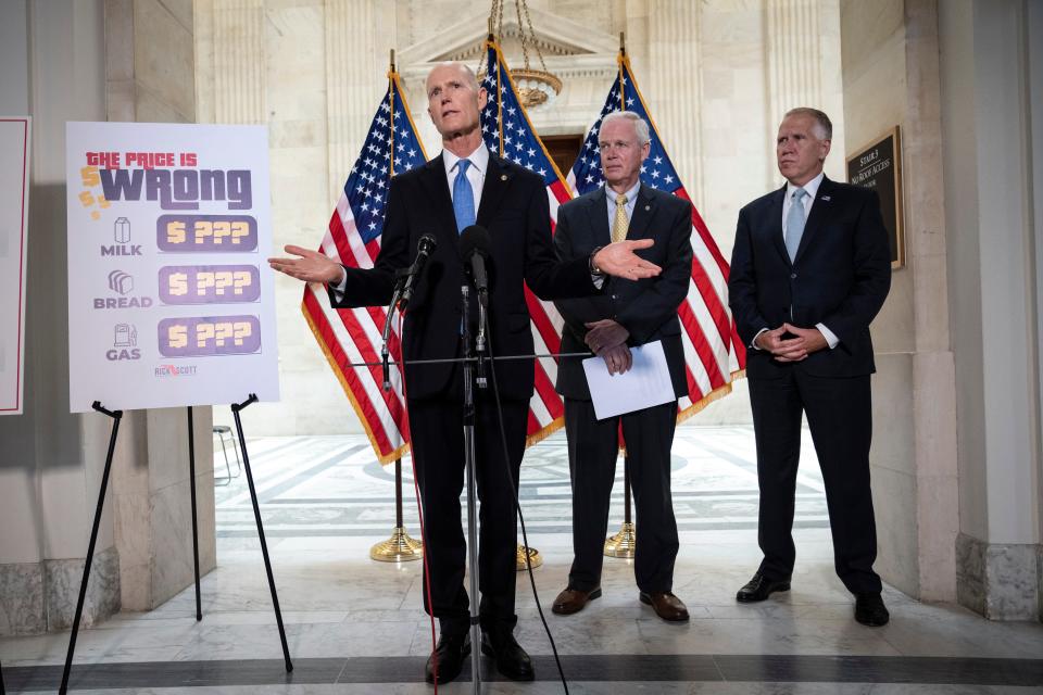 WASHINGTON, DC - MAY 26: (L-R) U.S. Sen. Rick Scott (R-FL), U.S. Sen. Ron Johnson (R-WI) and U.S. Sen. Thom Tillis (R-NC) hold a news conference about inflation on Capitol Hill on May 26, 2021 in Washington, DC. The group of Republican senators discussed rising consumer prices and the potential effects of inflation on families and businesses recovering from the pandemic.