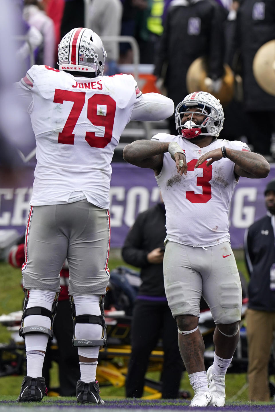 Ohio State running back Miyan Williams, right, celebrates with offensive lineman Dawand Jones after scoring a touchdown during the second half of an NCAA college football game against Northwestern, Saturday, Nov. 5, 2022, in Evanston, Ill. Ohio State won 21-7. (AP Photo/Nam Y. Huh)