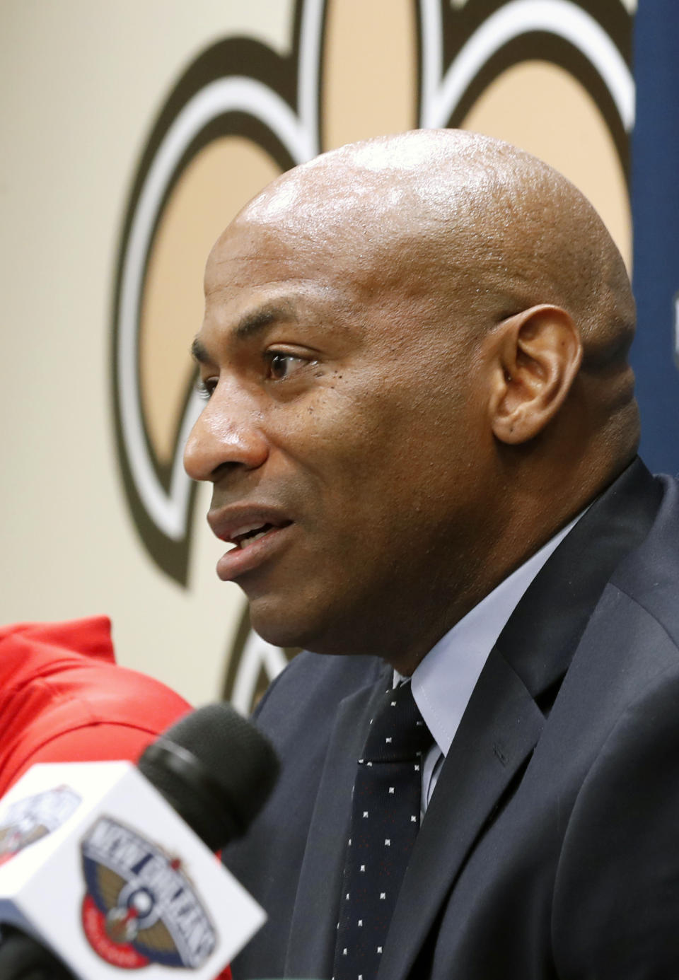 FILE - In this July 13, 2018, file photo, New Orleans Pelicans general manager Dell Demps speaks at a news conference in Metairie, La. A person familiar with the situation says the Pelicans have fired general manager Dell Demps. The person spoke to The Associated Press on condition of anonymity on Friday, Feb. 15, 2019, because the club has not announced it. Demps did not immediately return voice and text messages left with him Friday morning. (AP Photo/Gerald Herbert, File)