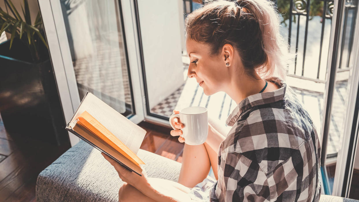 woman reading book