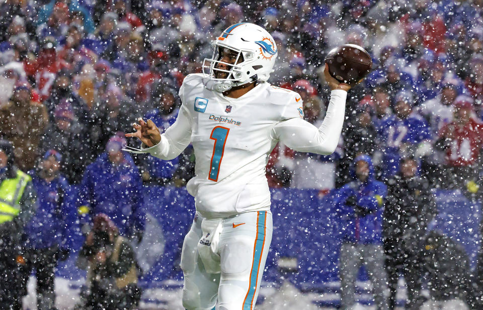 Miami Dolphins quarterback Tua Tagovailoa (1) sets up to pass during fourth quarter of an NFL football game against the Buffalo Bills at Highmark Stadium on Saturday, Dec. 17, 2022 in Orchard Park, N.Y. (David Santiago/Miami Herald via AP)