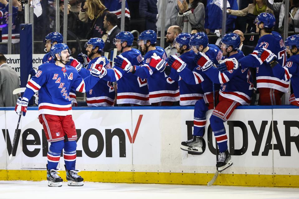 Apr 21, 2024; New York, New York, USA; New York Rangers left wing Chris Kreider (20) celebrates with his teammates after scoring a goal in the third period against the Washington Capitals in game one of the first round of the 2024 Stanley Cup Playoffs at Madison Square Garden. Mandatory Credit: Wendell Cruz-USA TODAY Sports