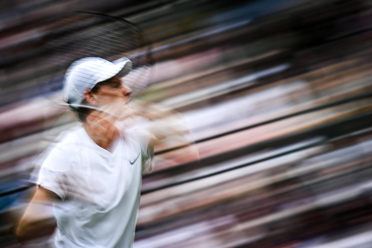 Sinner returns a serve against Germany's Yannick Hanfmann. (Ben Stansall/AFP via Getty Images)