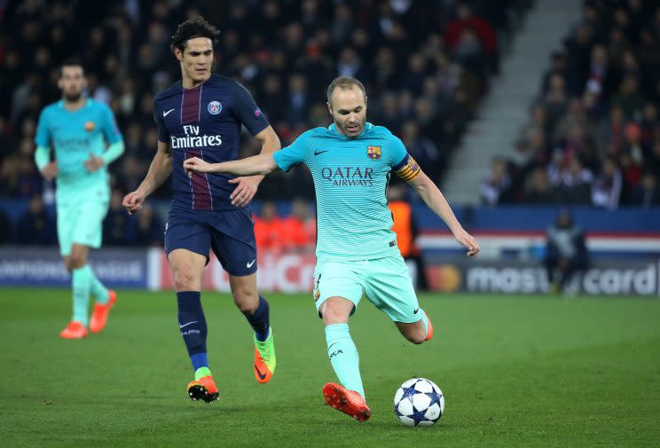 Edinson Cavani et Andres Iniesta (Getty Images)