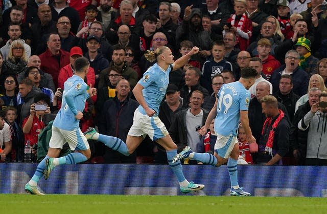 Haaland, centre, opened the scoring from the penalty spot