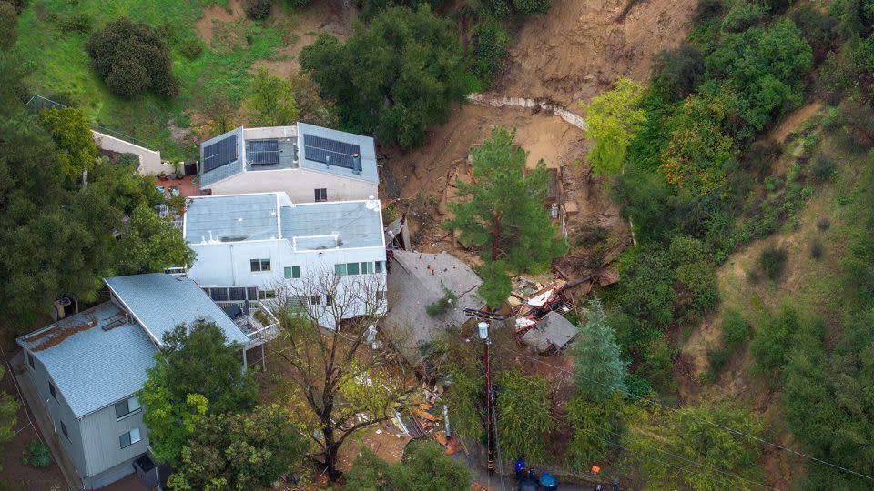 This aerial view Monday shows a home destroyed at the bottom of a landslide in Los Angeles. - David Mcnew/AFP/Getty Images