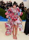 <p> Living up to her name as Queen of the Met Gala, Rihanna wore one of the most surprising outfits we've ever seen from her. The 2017 Met Gala theme was Comme des Garçon: Art of the In-Between, so of course Rihanna nailed it with this Comme Des Garçons floral ensemble. </p>